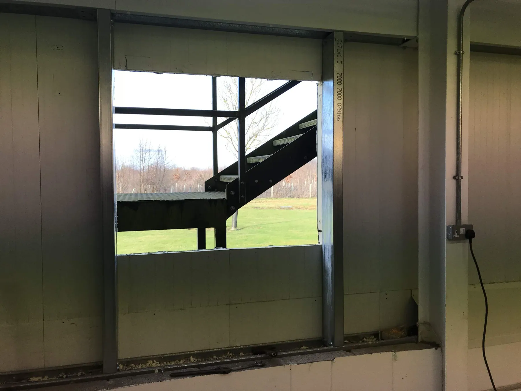 New Windows Cut into Composite Cladding, Wath, in progress
